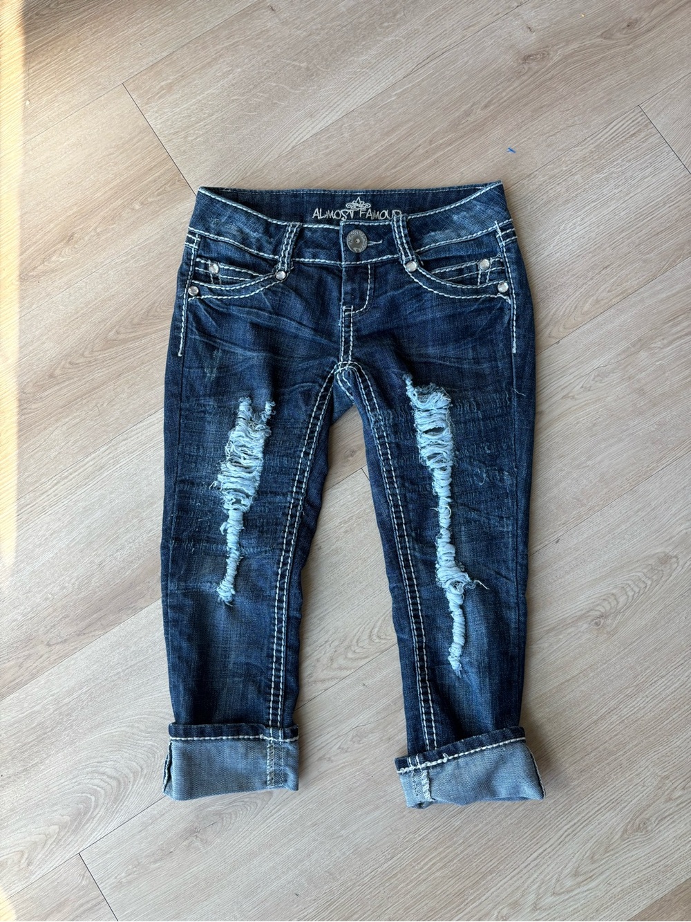 Almost Famous y2k blue low rise capri jeans with distressing